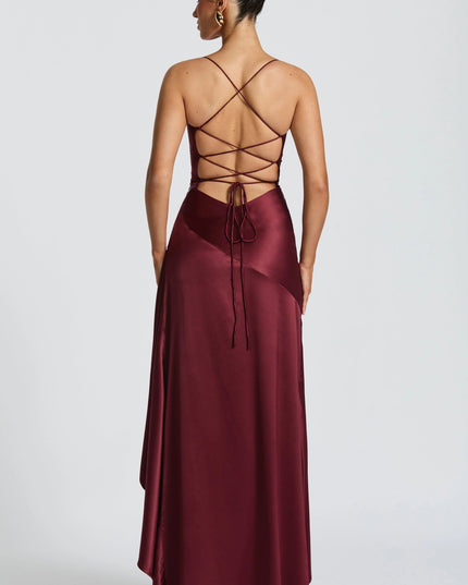Back view of burgundy satin maxi dress with lace-up crisscross back straps