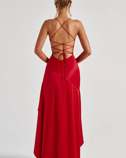 Rear detail of red formal dress showing laced back and flowing asymmetrical train
