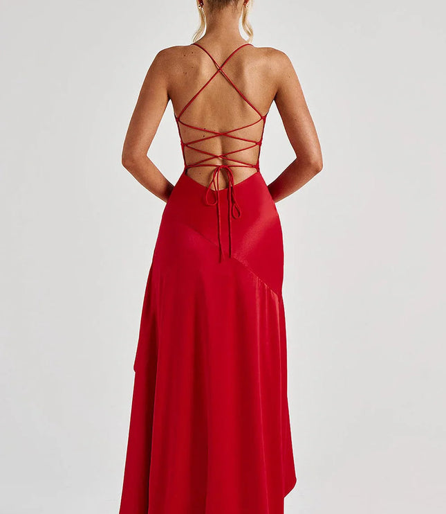 Rear detail of red formal dress showing laced back and flowing asymmetrical train