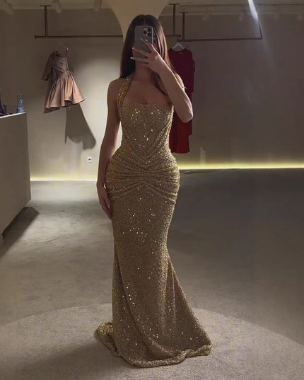 Gold sequin wedding guest maxi dress with ruched bodice and skirt, mirror view