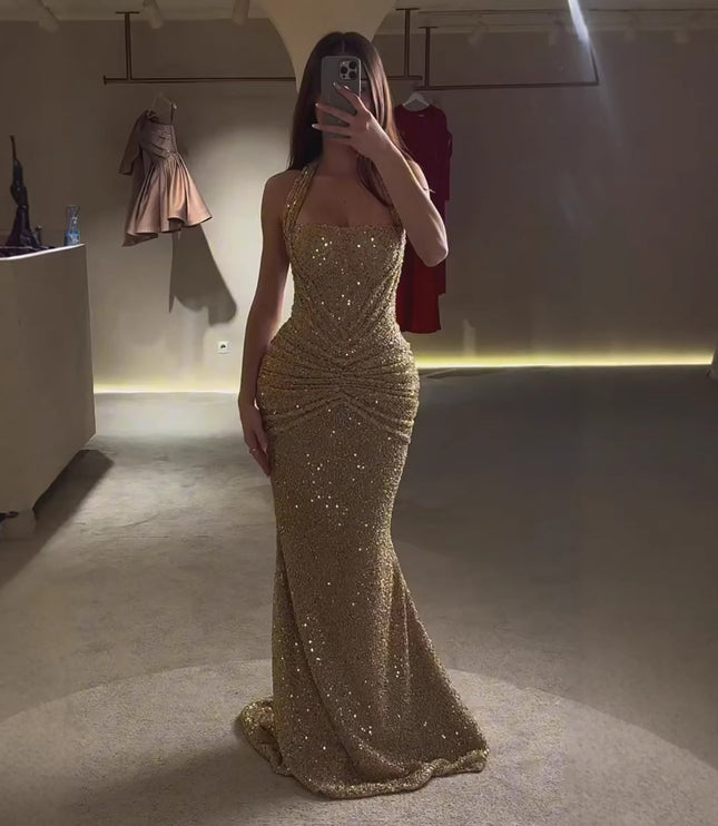 Gold sequin wedding guest maxi dress with ruched bodice and skirt, mirror view