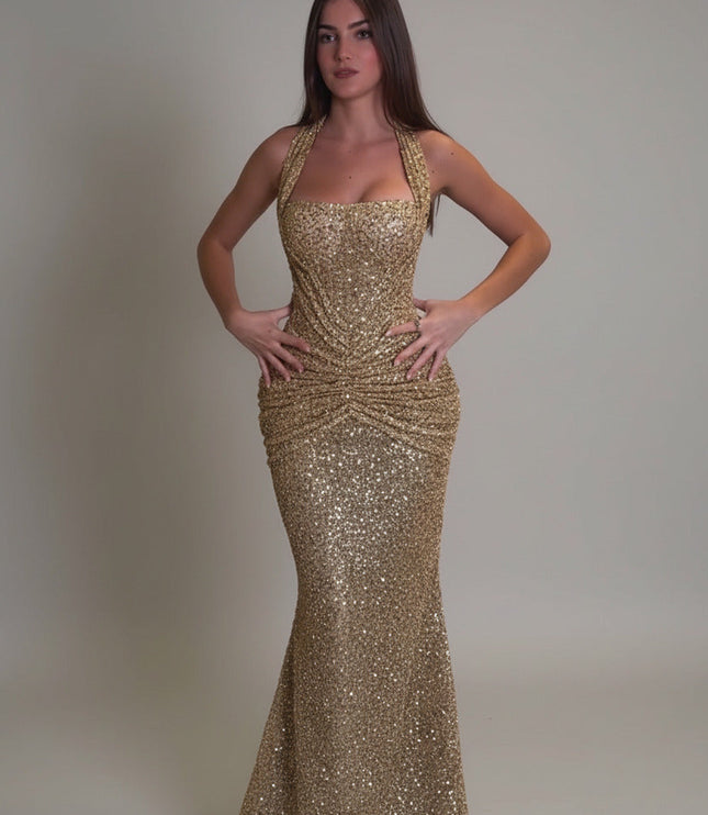 Gold sequin maxi dress with halter neckline and ruched waist, front view
