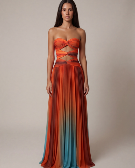 Front view of ombre strapless maxi dress with cutout bodice and pleated skirt