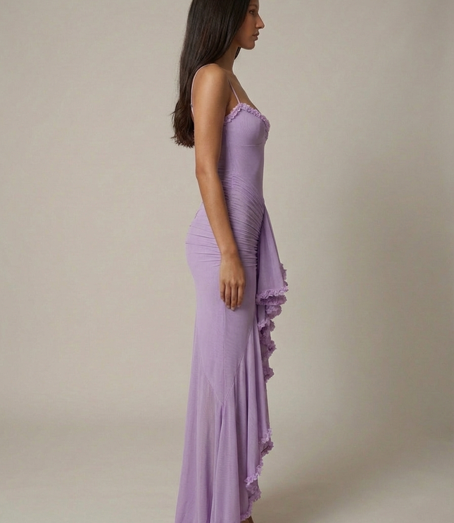 Side view of a lavender cocktail maxi dress with straps, fitted silhouette, and ruffled hem