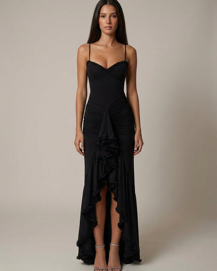 Black cocktail maxi dress with spaghetti straps, ruffle trim, and draped front slit detail