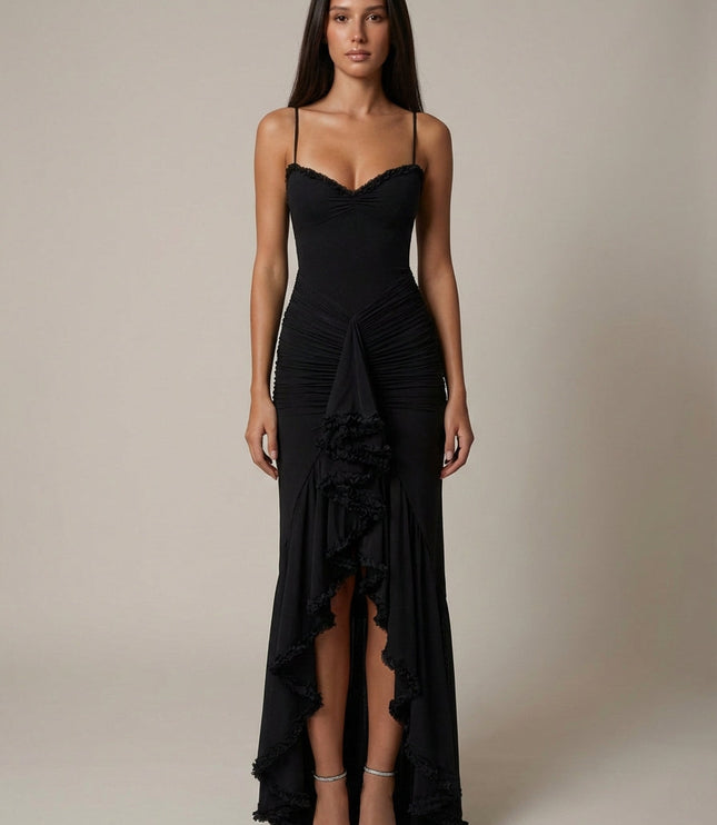 Black cocktail maxi dress with spaghetti straps, ruffle trim, and draped front slit detail