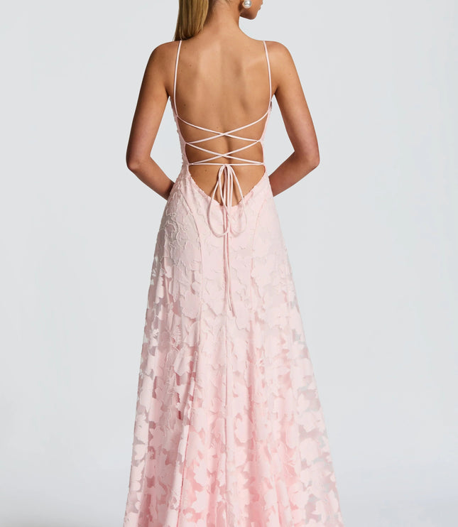 Back view of blush pink lace maxi dress with strappy criss-cross back design