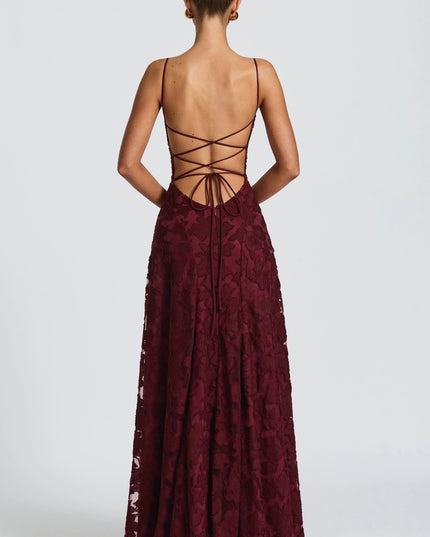 Back view of burgundy lace maxi dress with lace-up strappy back detail