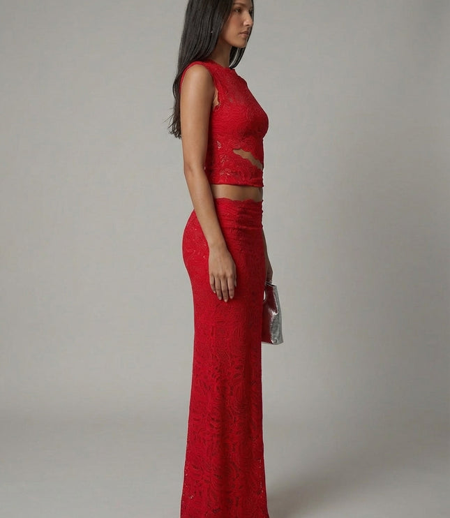 Side profile of red lace cropped top with midriff cutout and maxi skirt