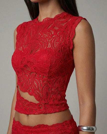 Close-up of red lace cropped top showing intricate paisley pattern and cutout