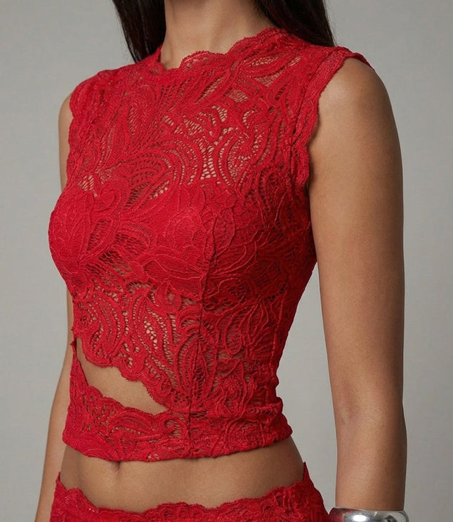 Close-up of red lace cropped top showing intricate paisley pattern and cutout