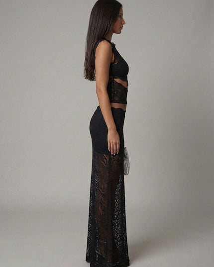 Side view of black lace cropped sleeveless top with matching maxi skirt