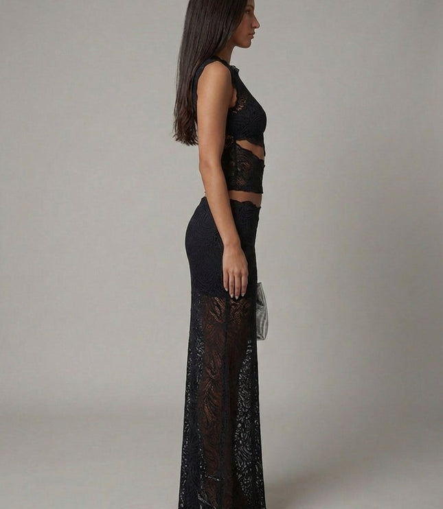 Side view of black lace cropped sleeveless top with matching maxi skirt