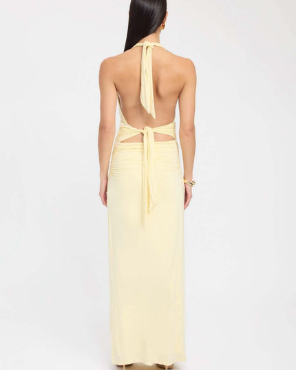 Front view of blue formal maxi halter dress with ruched bodice and floor length skirt