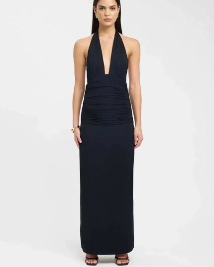 Front view of a black halter top maxi dress with deep plunge neckline and ruched bodice