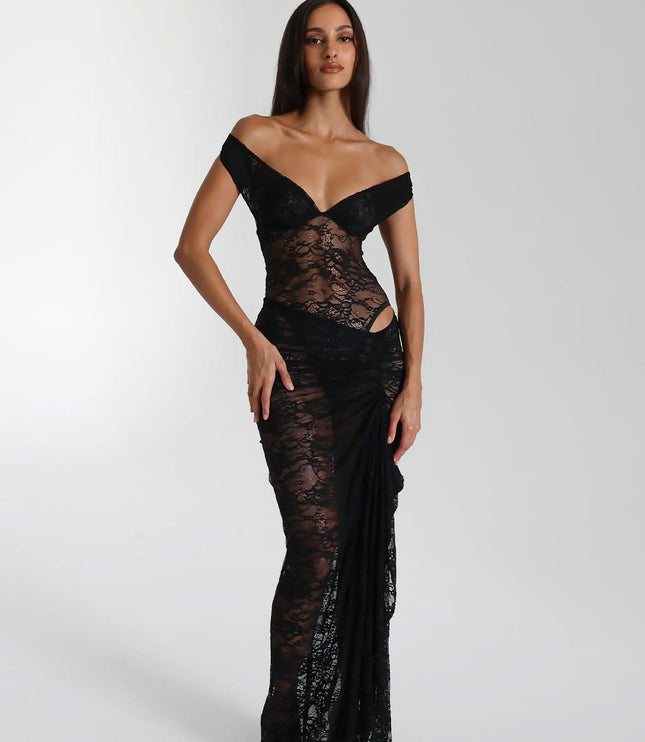 Front view of black off shoulder lace maxi dress with fitted sheer skirt and slit