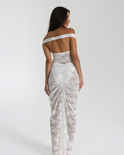 Close-up of black off shoulder lace maxi dress with deep neckline and sheer floral lace