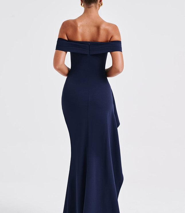 Back view of navy off shoulder maxi dress with open shoulders and long skirt