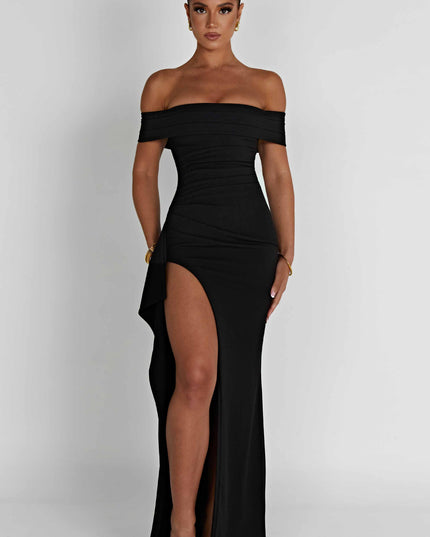 Front view of black off shoulder maxi dress with thigh slit and fitted formal silhouette