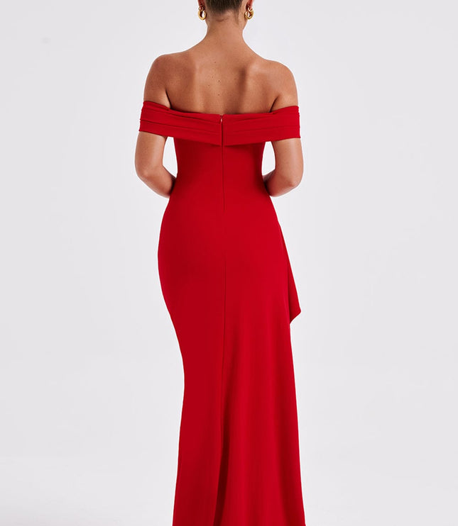 Back view of red off shoulder maxi dress with fitted silhouette and floor length hem