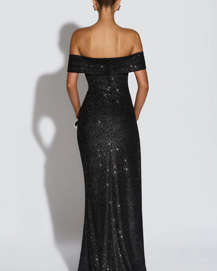 Back view of black off shoulder maxi dress with glitter finish and fitted silhouette