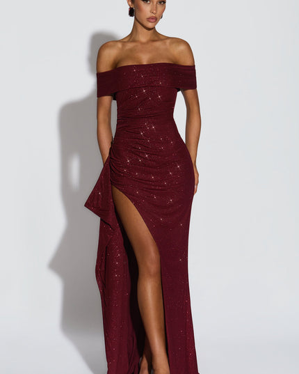Front view of burgundy off shoulder maxi dress with glitter detail and high slit