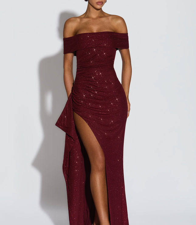 Front view of burgundy off shoulder maxi dress with glitter detail and high slit