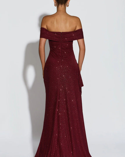 Close front view of burgundy off shoulder maxi dress with ruched bodice and side slit