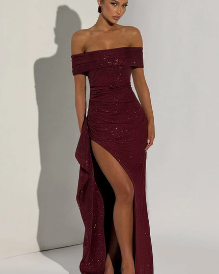 Front view of burgundy formal off shoulder maxi dress with high slit and glittery finish