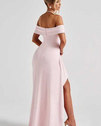 Back view of light pink off shoulder maxi dress with zipper closure and floor-length hem