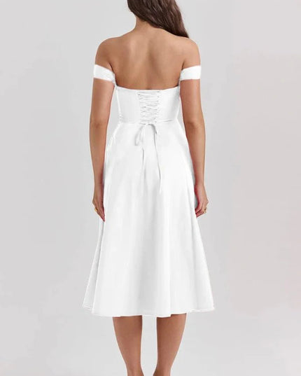 Back view of white off shoulder midi dress with lace-up bodice and flowing midi skirt