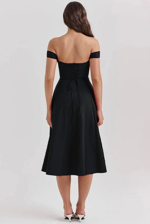 Back view of black off shoulder midi dress with lace-up waist and midi skirt
