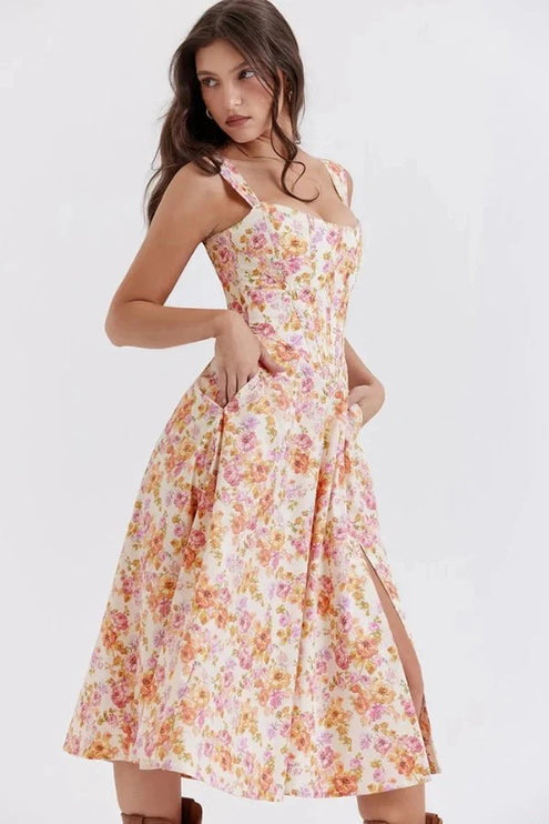 Close side view of floral off shoulder midi dress showing corset seams and slit detail