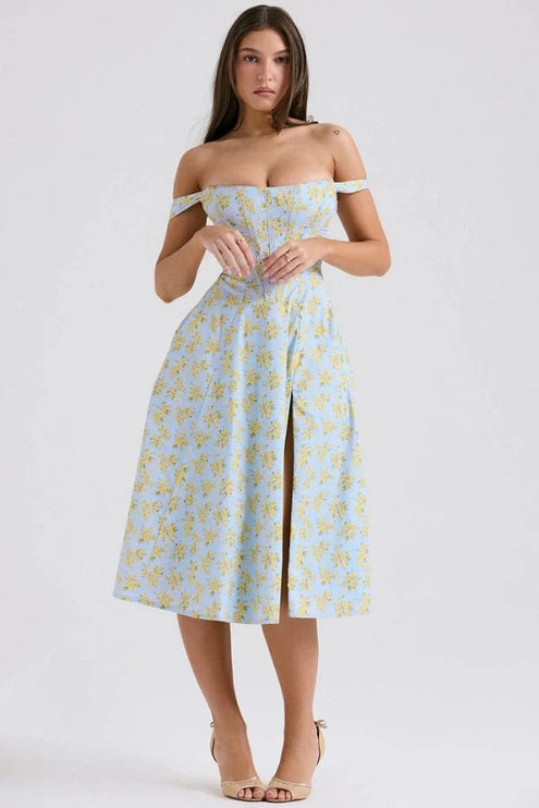 Off shoulder midi dress with corset-style bodice, light blue floral print, and knee-length hem