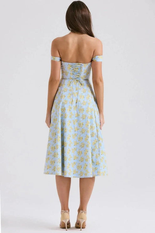 Back view of light blue off shoulder midi dress with yellow floral print and ruched bodice