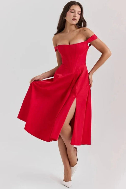 Red off shoulder midi dress shown in side view with flowing skirt and high front slit