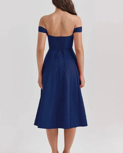 Back view of navy blue off shoulder midi dress with lace-up bodice and midi hemline