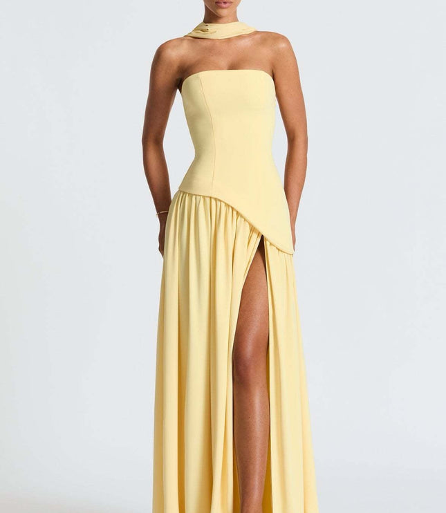 Yellow strapless maxi dress with asymmetrical draped hem detail