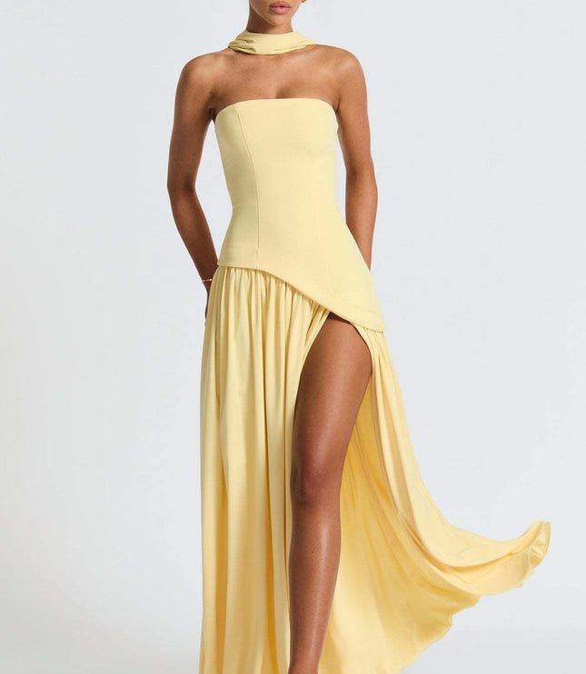 Back view of yellow strapless formal maxi with corset boning