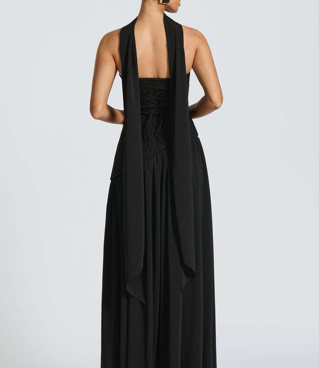 Black strapless formal maxi dress back view with halter tie and pleated skirt