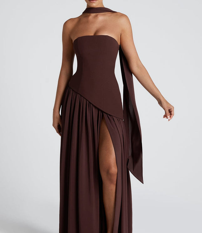 Brown strapless corset maxi dress with asymmetrical pleated skirt and high slit