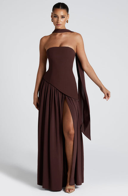 Brown strapless corset maxi dress with asymmetrical pleated skirt and high slit