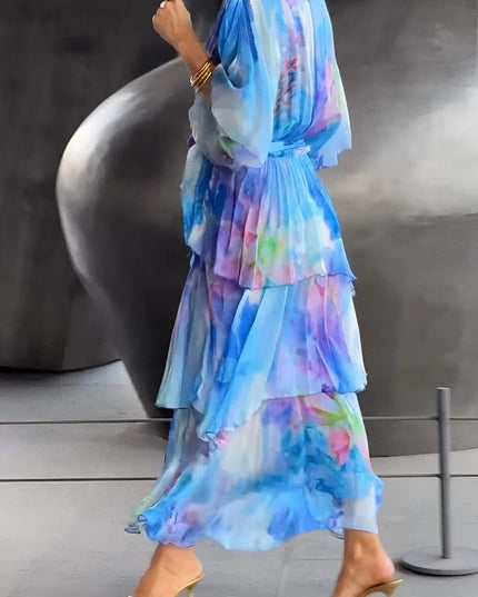 Back view of watercolor floral midi dress showing tiered ruffled skirt detail