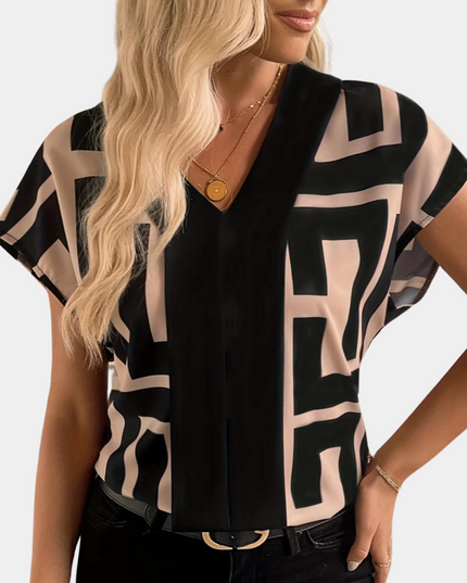 Women's geometric short sleeve blouse with black and tan abstract rectangular blocks