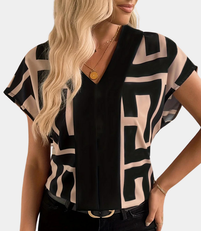 Women's geometric short sleeve blouse with black and tan abstract rectangular blocks