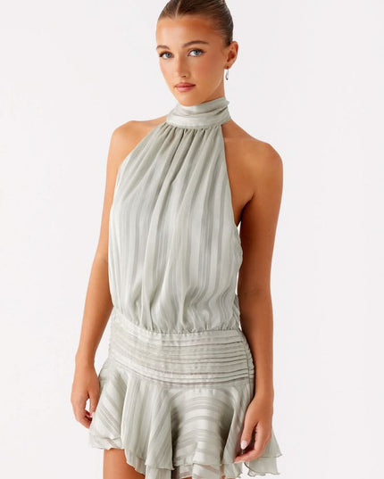 Sage green pleated halter mini dress front view with gathered bodice detail