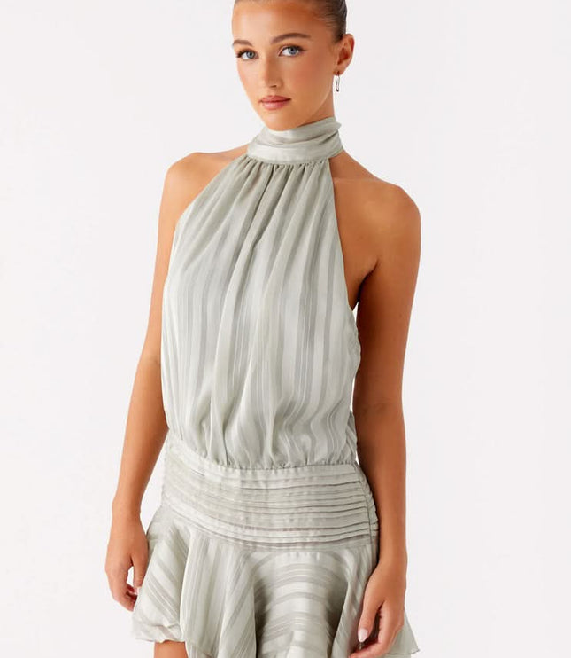 Sage green pleated halter mini dress front view with gathered bodice detail