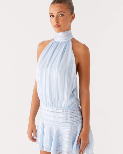 Light blue pleated halter mini dress side profile showing gathered bodice