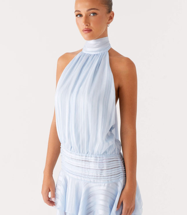 Light blue pleated halter mini dress side profile showing gathered bodice