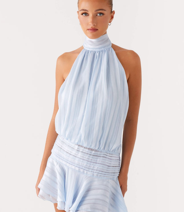 Light blue pleated halter mini dress front view with wrapped waist detail